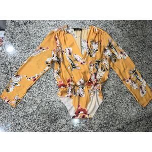 Akira Floral Long Sleeve Bodysuit In Rich Marigold Yellow Floral Print-L